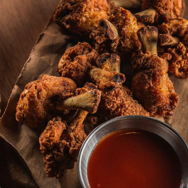 Crispy fried chicken wings with dipping sauce